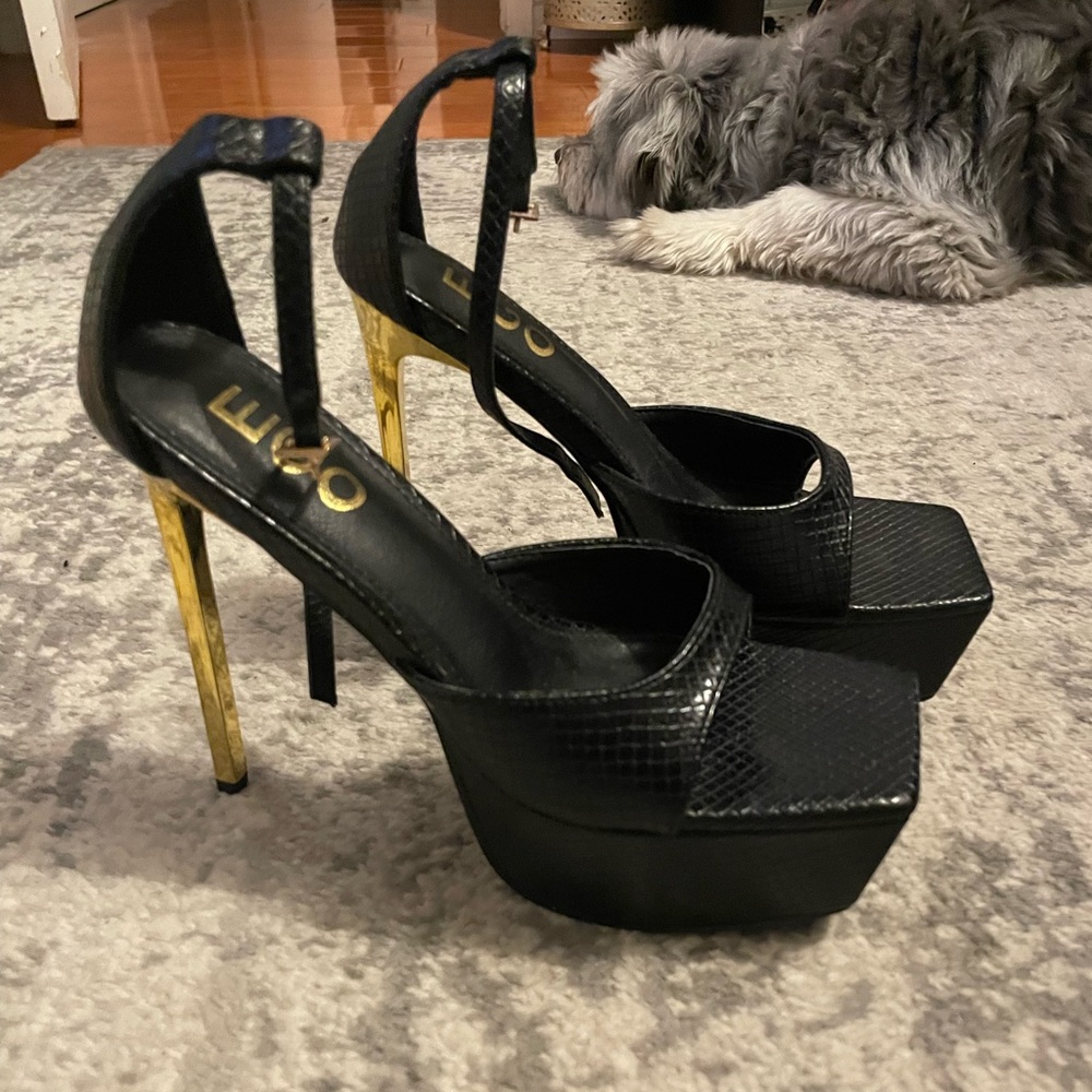 Black platform stiletto with gold heel